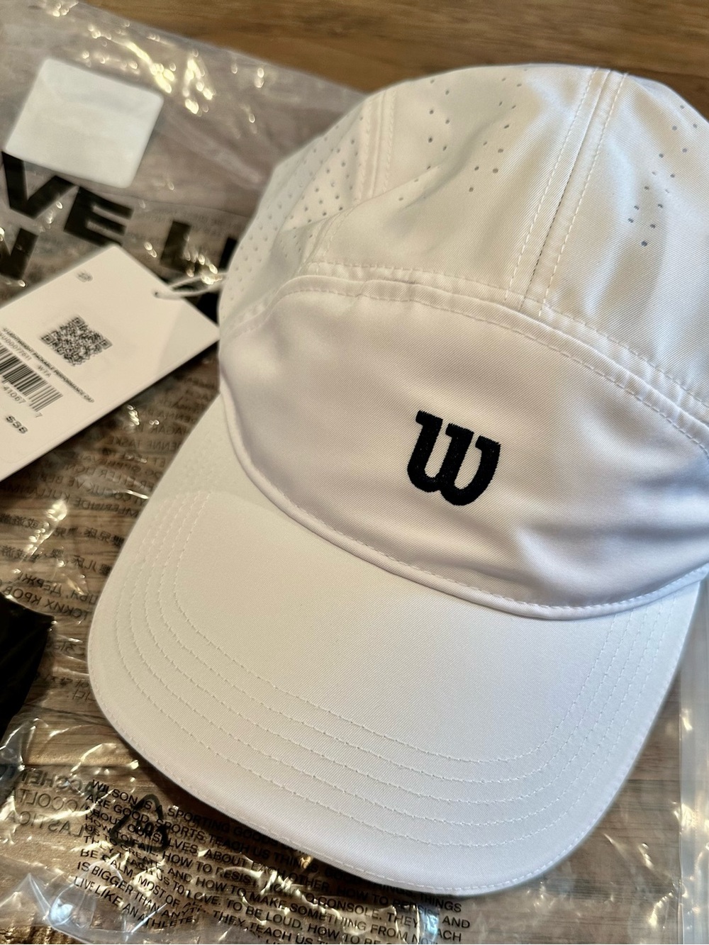 Wilson White Performance Cap with Black Logo Accent